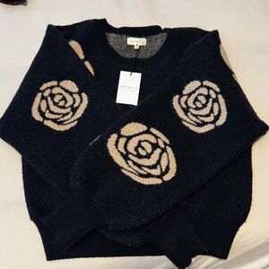 Promesa Black Sweater with Tan Rose Design